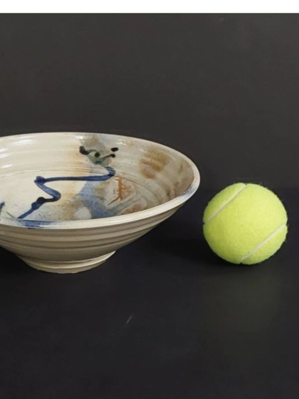 Artistic Ceramic Bowl with Blue and Brown Accents